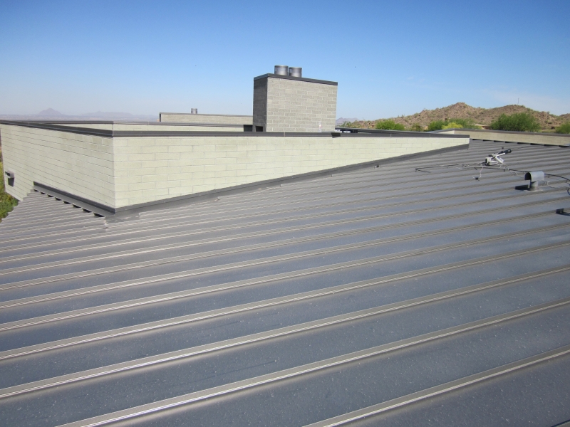 Standing Seam Metal Roof next to a flat roof