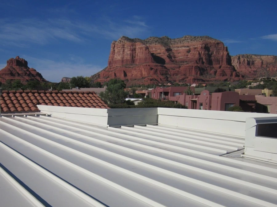 Flat Metal Roof with a Masa in the background