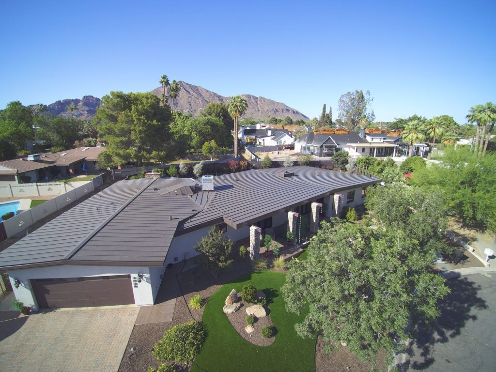 A low slope standing seam metal roof on a home in Arizona.