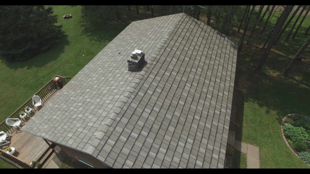 a variegated color metal slate roof.
