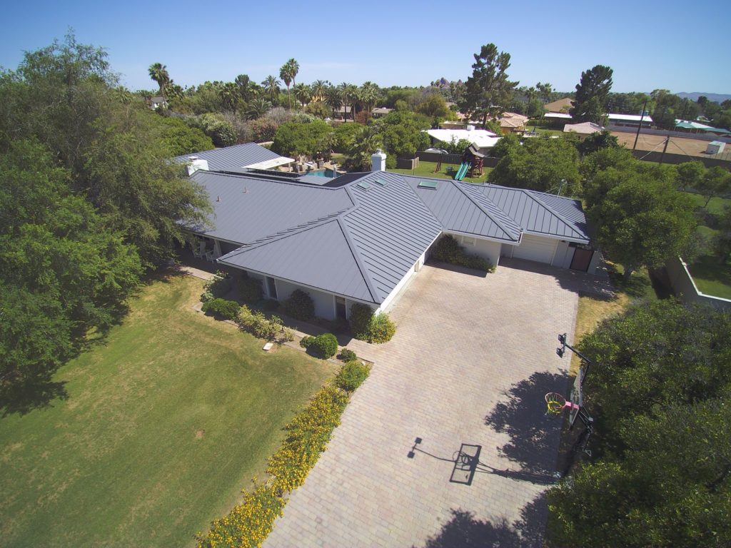 A home with a gray metal roof.