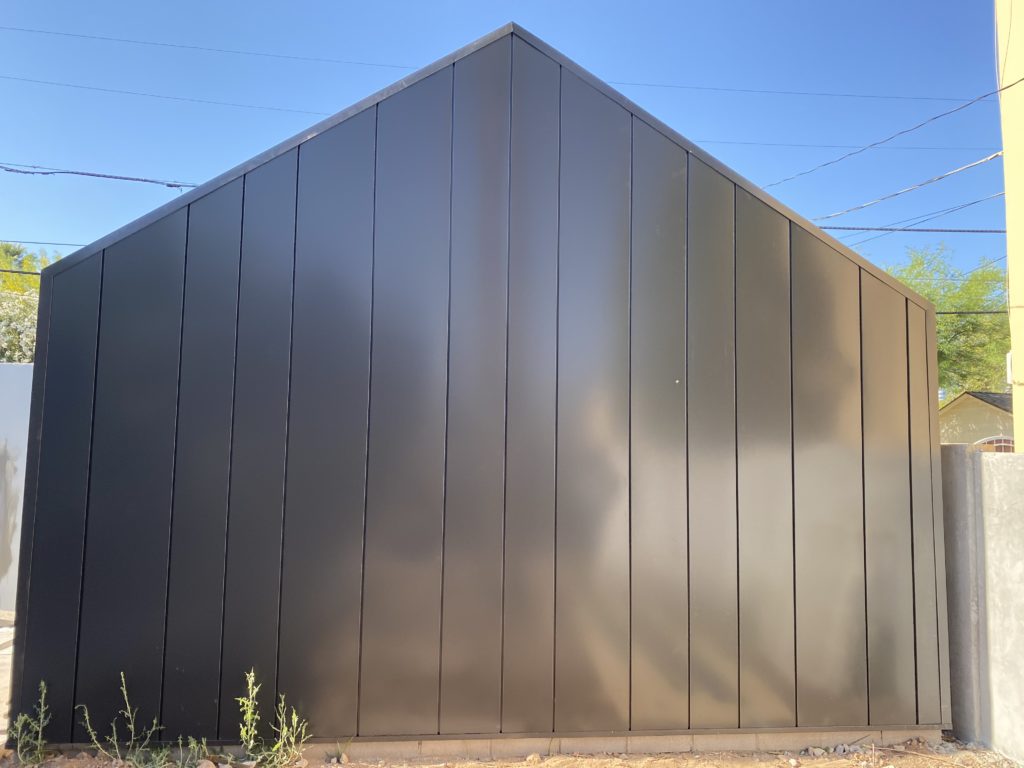 A wall panel installed by Vertex Roofing.