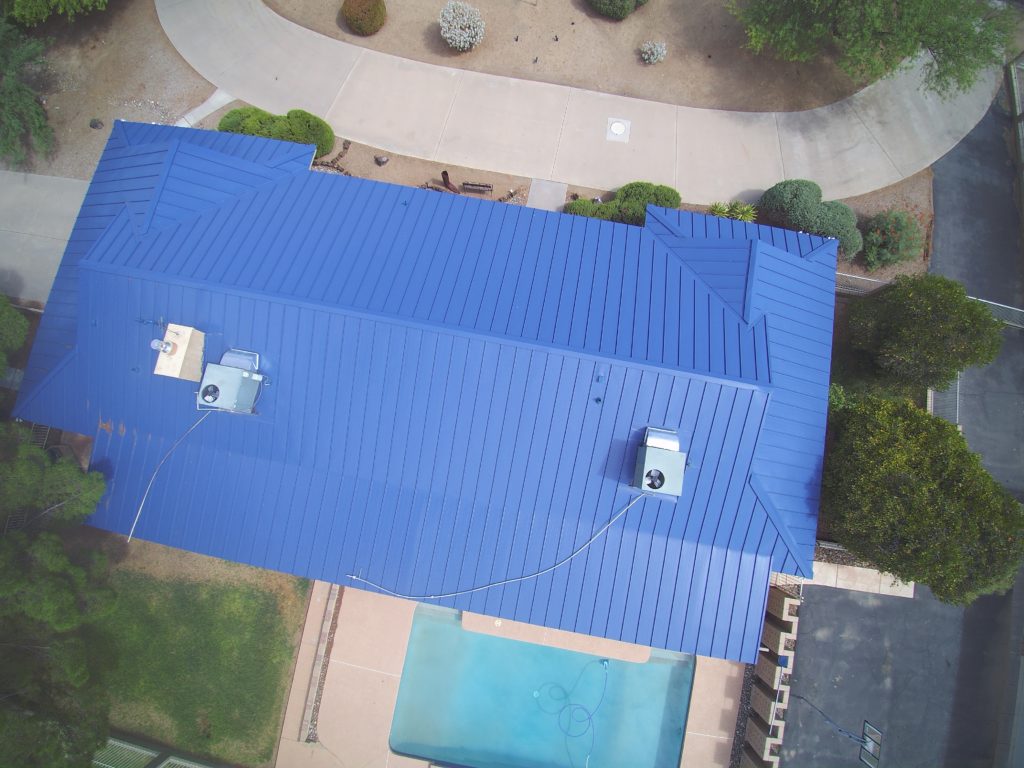 A home with a blue metal roof