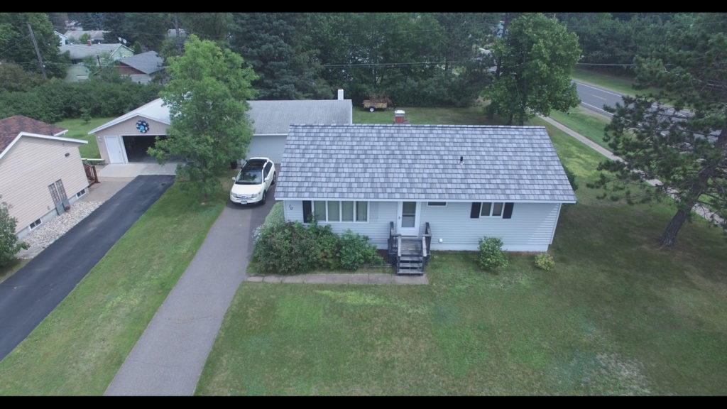 A drone image of a new metal shake roof installation completed by Vertex Metal Roofing