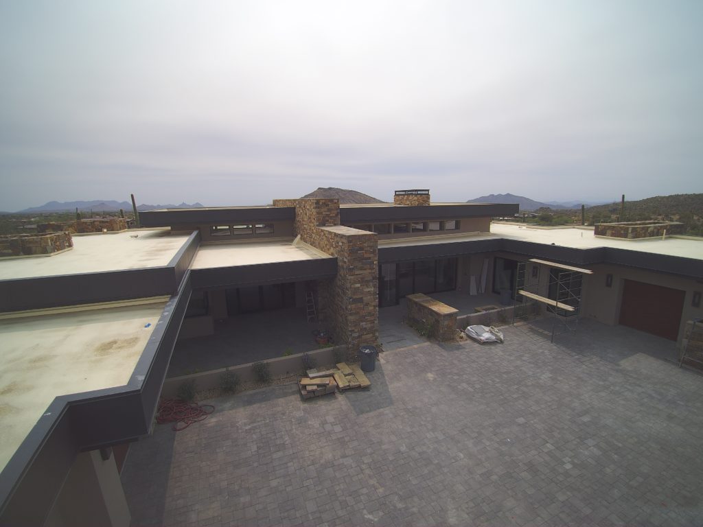 The courtyard of a project in Arizona being worked on by Vertex Roofing.
