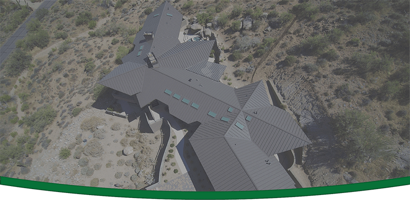 An aerial view of a completed metal roofing job in Arizona.