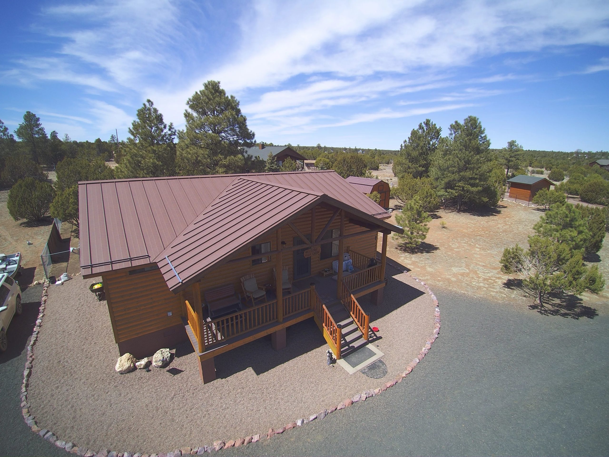 New Metal Roof on a log home by Vertex Roofing