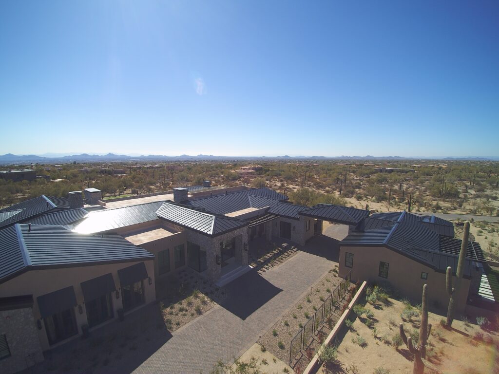 Arizona home with a new standing seam metal roof.
